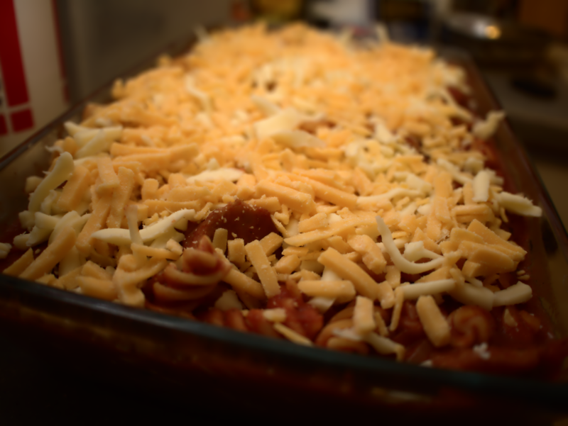 Don't hold back on the cheese. That poking out pasta will dry out in the oven due to insufficient cheese coverage :(